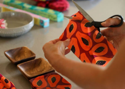 Meli Wraps Beeswax Wraps photo of a bulk roll of beeswax wraps in purple papaya print