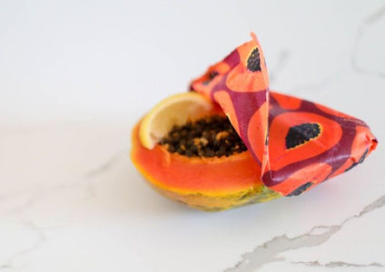Meli Wraps Beeswax Wraps photo of a bulk roll of beeswax wraps in purple papaya print